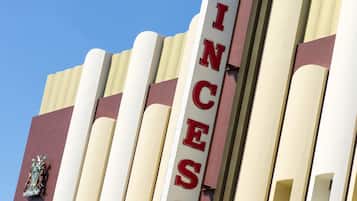 A building with a vertical sign reading "PRINCESS."