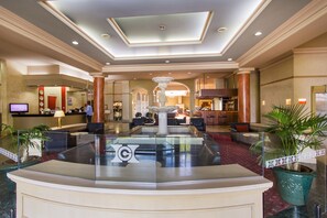 Relax in style with comfortable seating areas and a calming water feature.