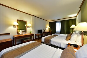 Triple Room | Minibar, in-room safe, desk, iron/ironing board