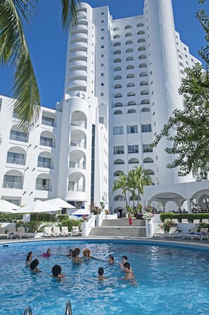 Outdoor pool, pool umbrellas, pool loungers