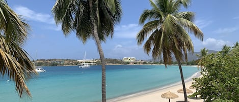 On the beach, beach umbrellas, snorkelling, beach bar