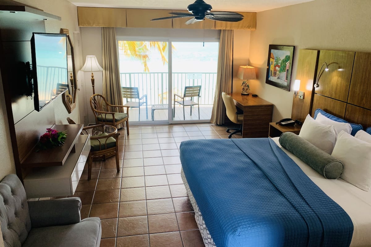 Beachfront Premium King Room | In-room safe, individually decorated, desk, blackout drapes