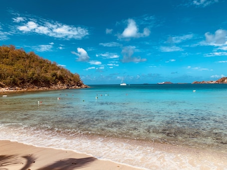 On the beach, beach umbrellas, snorkeling, beach bar