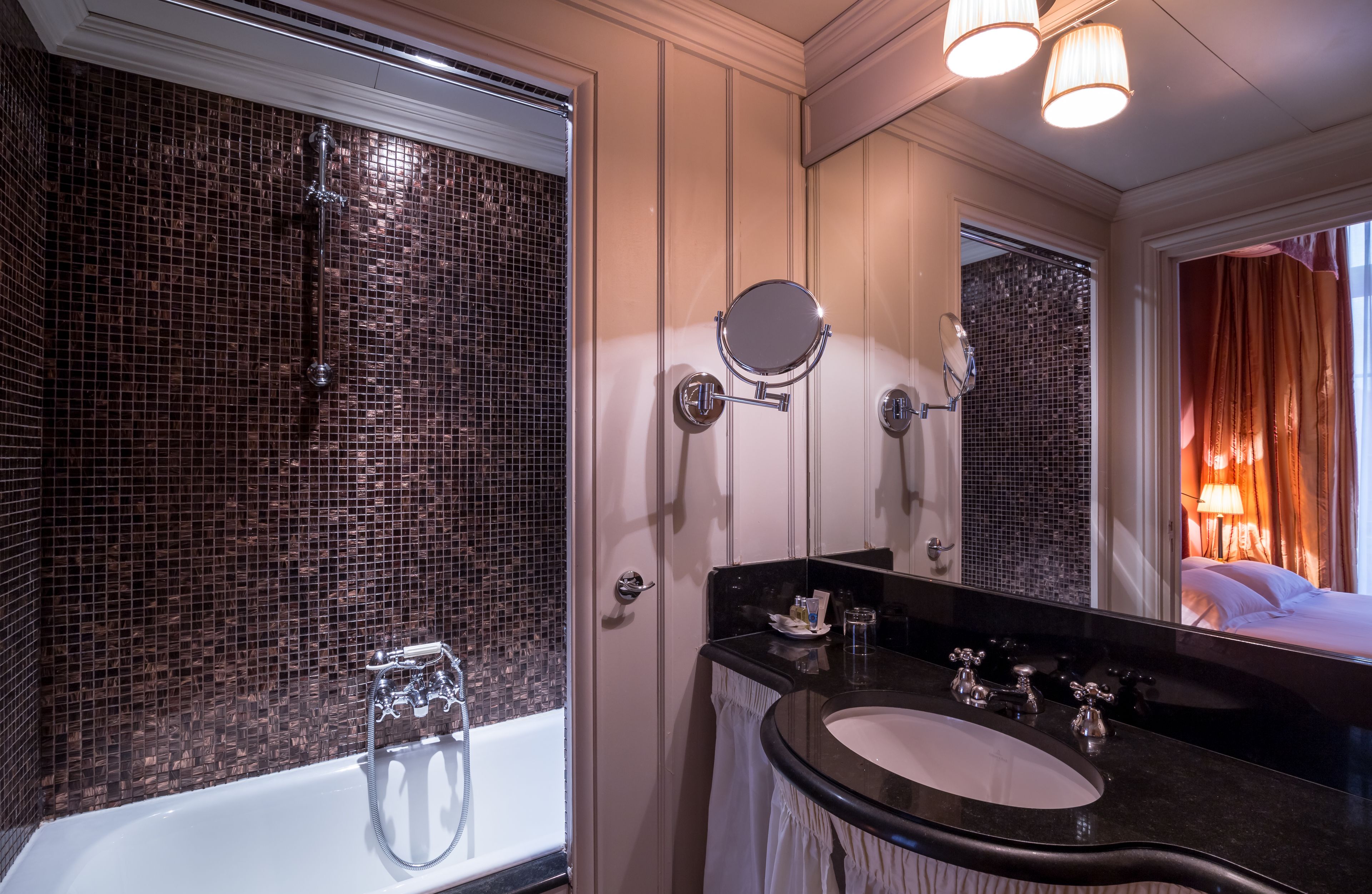 designer toiletries, hair dryer, bathrobes, towels