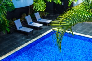 Outdoor pool, sun loungers