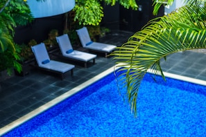 Outdoor pool, sun loungers