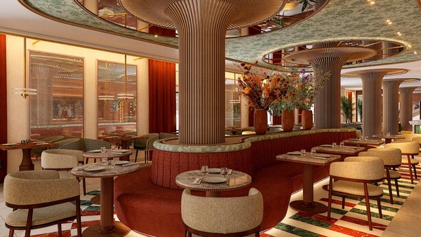 A spacious lobby with a central column, multiple seating areas, and a patterned floor. - Palacio San Juan, A Royal Hideaway Hotel (Murcia)