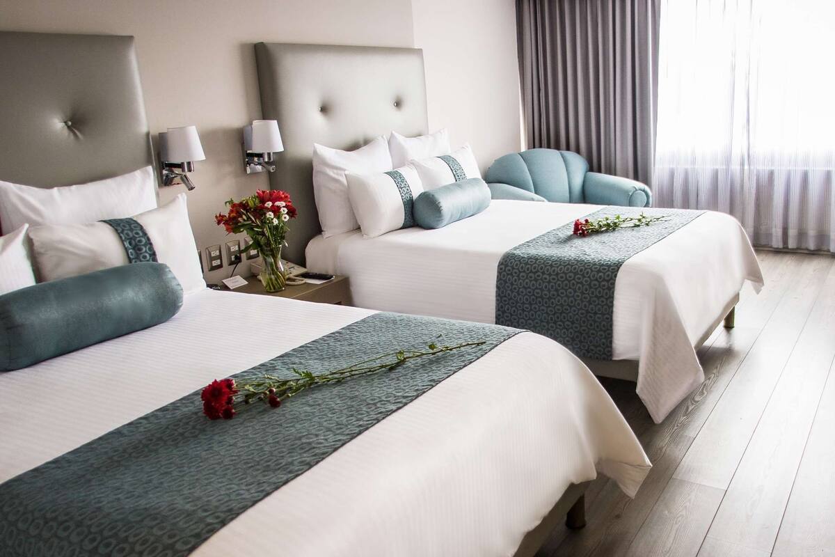 Premium bedding, down comforters, in-room safe, desk