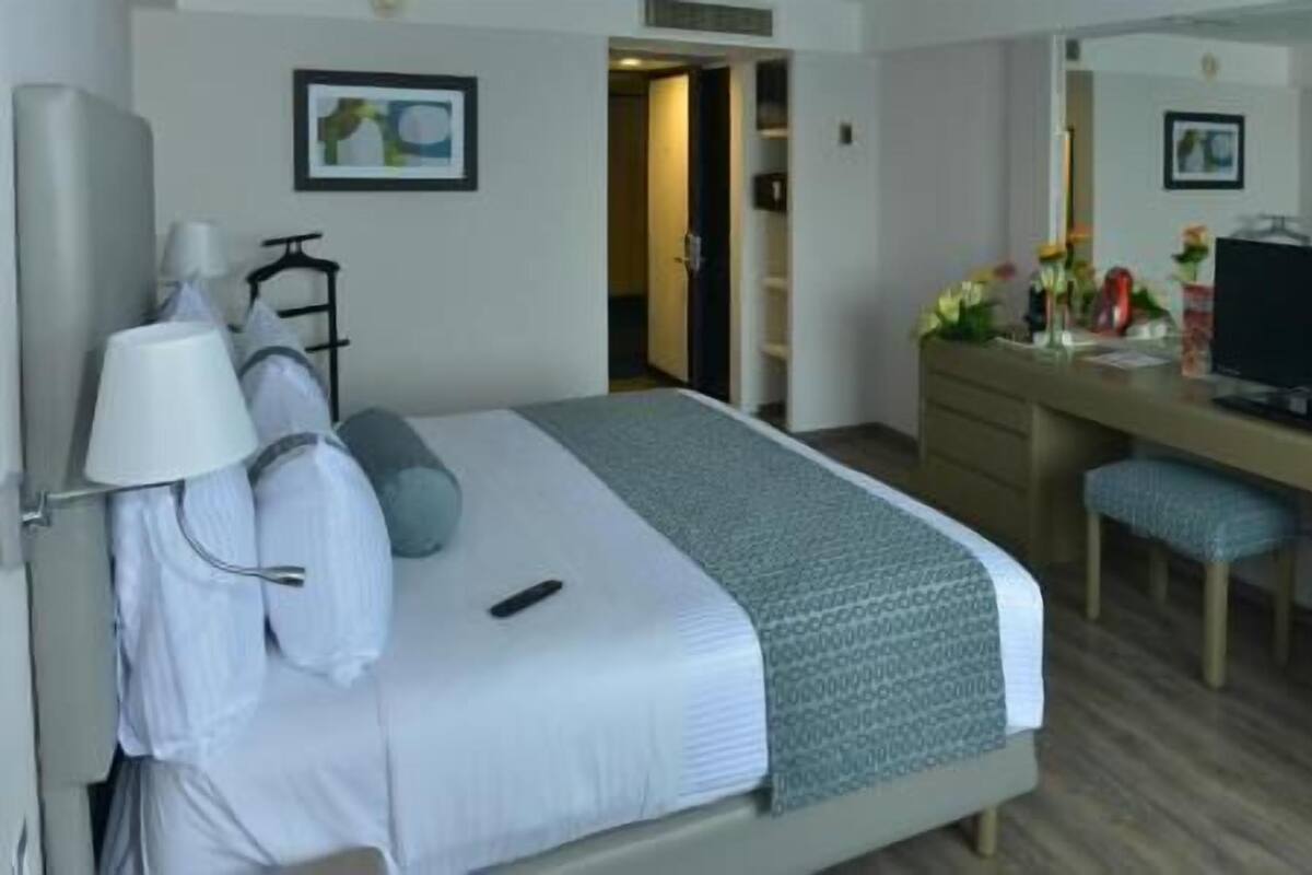 Premium bedding, down comforters, in-room safe, desk