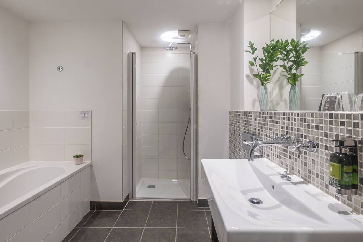 hair dryer, bathrobes, slippers, towels