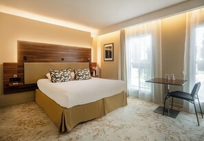 Premium bedding, pillow-top beds, minibar, in-room safe