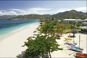 On the beach, sun loungers, beach umbrellas, beach towels