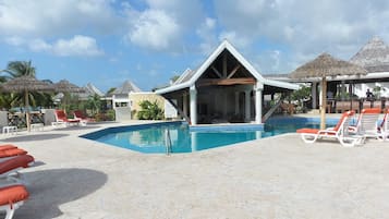 Outdoor pool, pool umbrellas, sun loungers