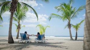 Private beach, sun-loungers, beach towels, beach volleyball