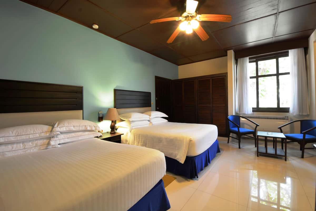 Bungalow, Oceanfront | Minibar (free items), in-room safe, desk, blackout drapes