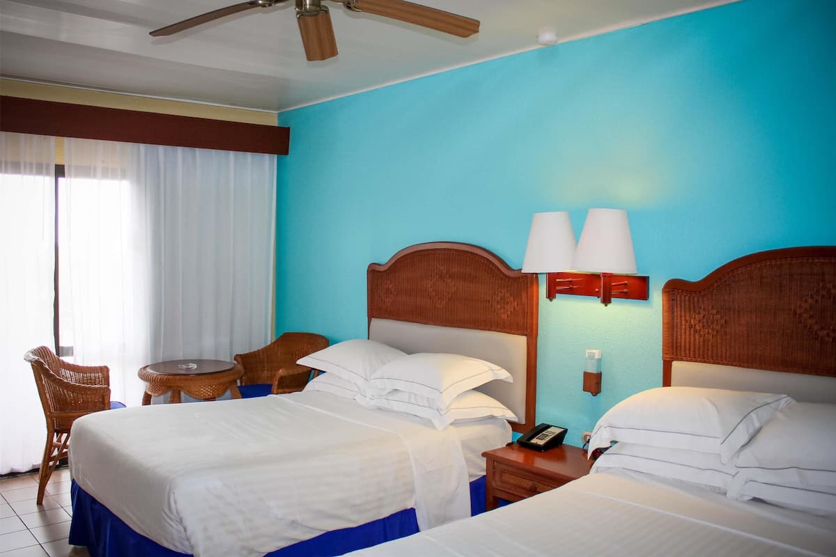 Double Room | Minibar (free items), in-room safe, desk, blackout drapes