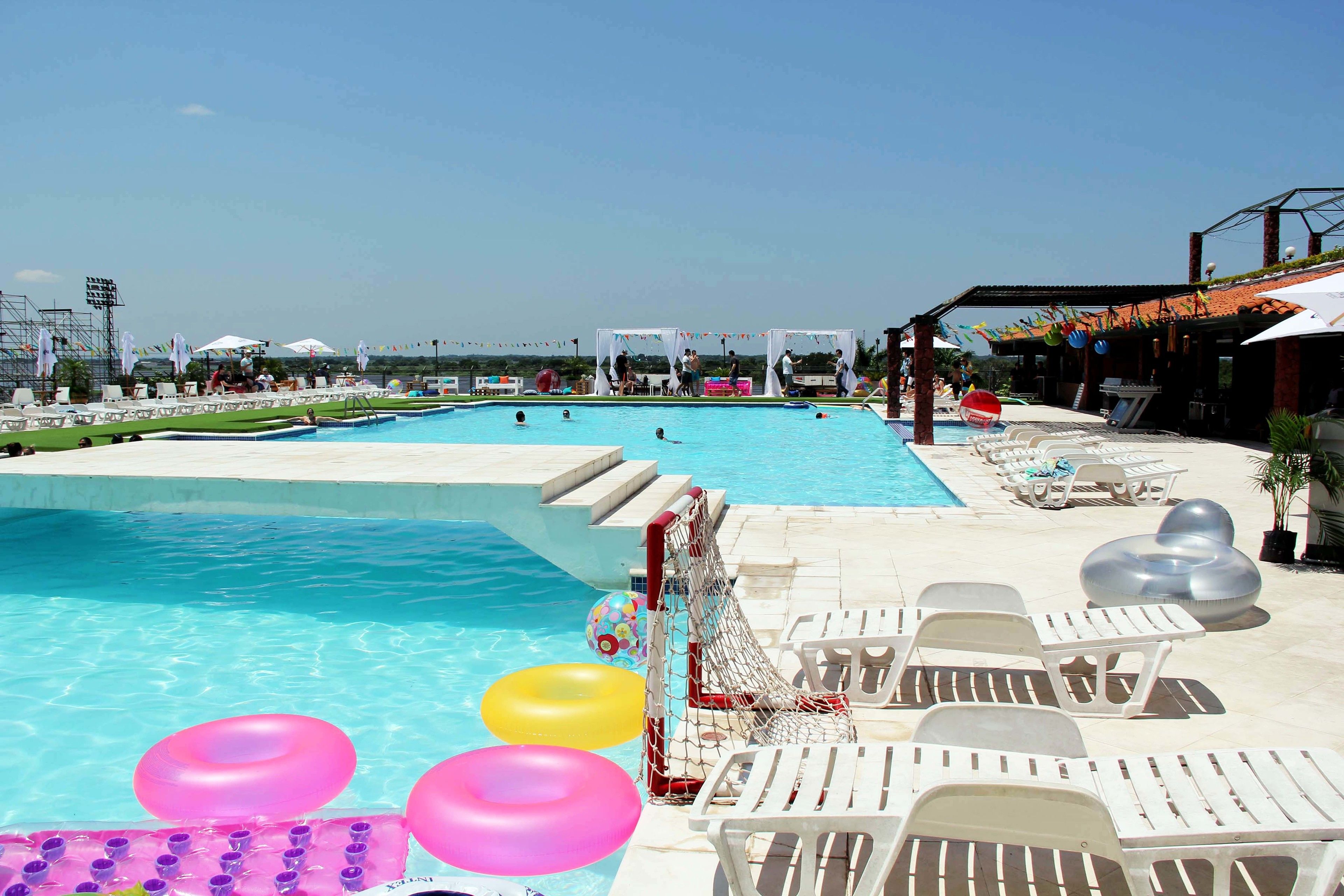 2 outdoor pools, pool umbrellas, pool loungers