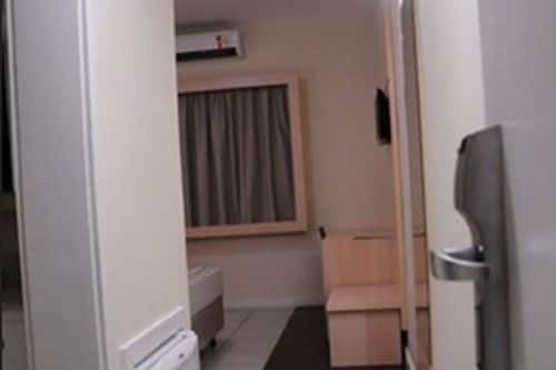 Quarto casal executivo | Frigobar, escrivaninha, cortinas blackout, quartos à prova de som