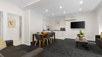 Three Bedroom Villa | Living area | 32-inch flat-screen TV with digital channels, TV, Netflix