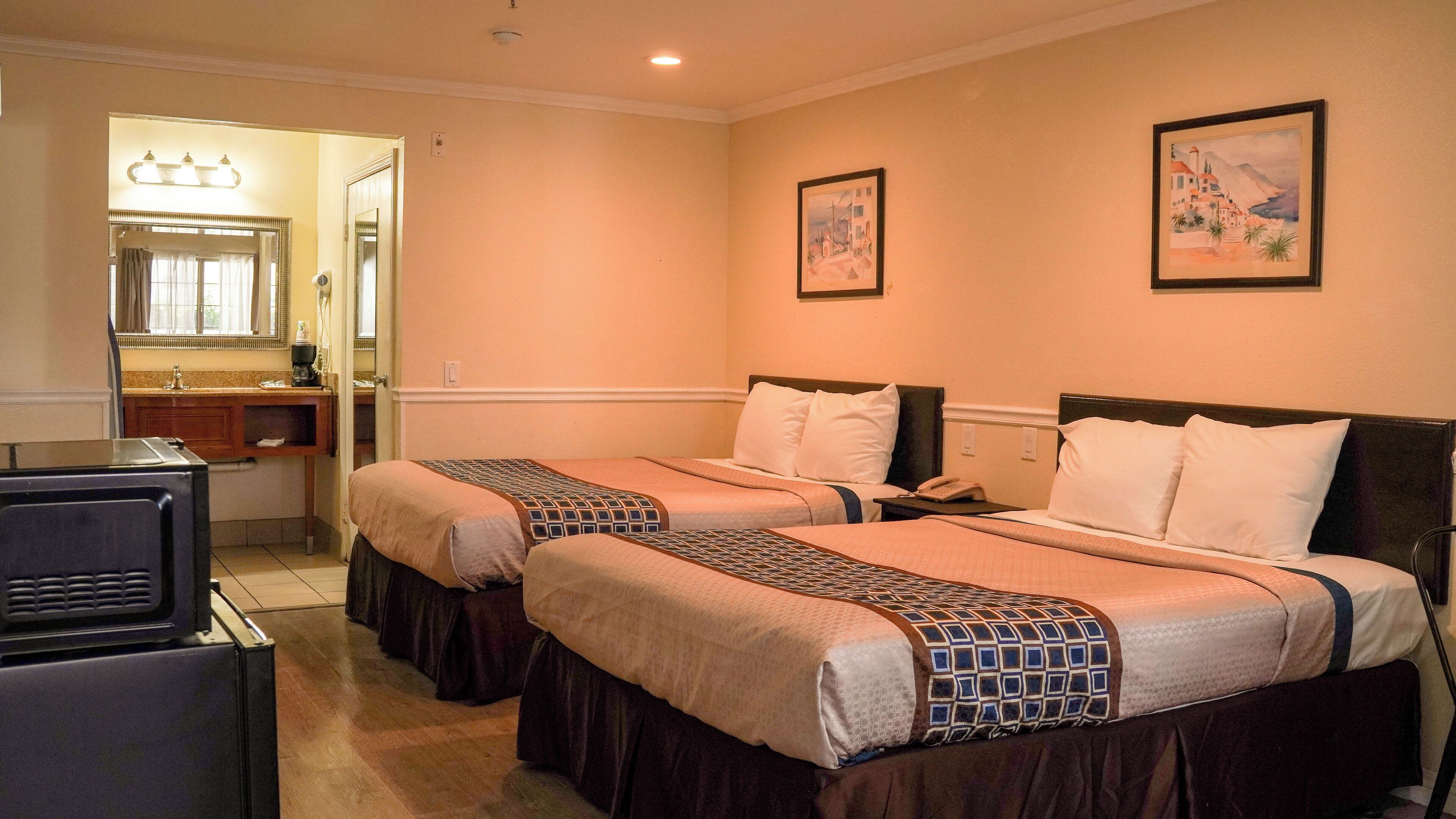 Two Queens | Iron/ironing board, rollaway beds, free WiFi, bed sheets