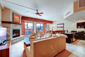 Condo, 2 Bedrooms | Living room | Flat-screen TV