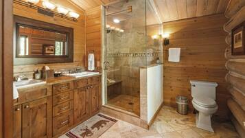 Cabin, 4 Bedrooms (Trappers, Home, On-Mountain) | Bathroom | Combined shower/tub, free toiletries, hair dryer, bathrobes