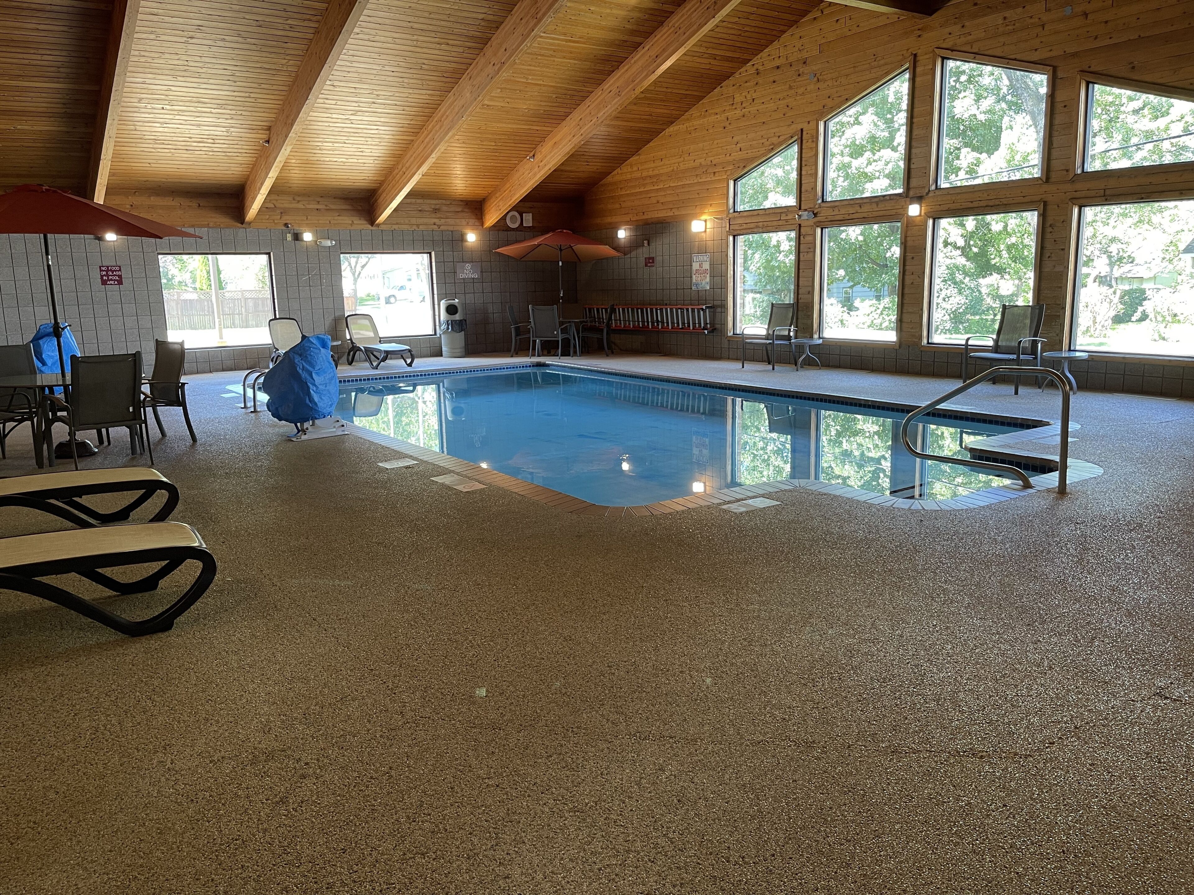 indoor pool, open 7:00 am to midnight, pool umbrellas, pool loungers