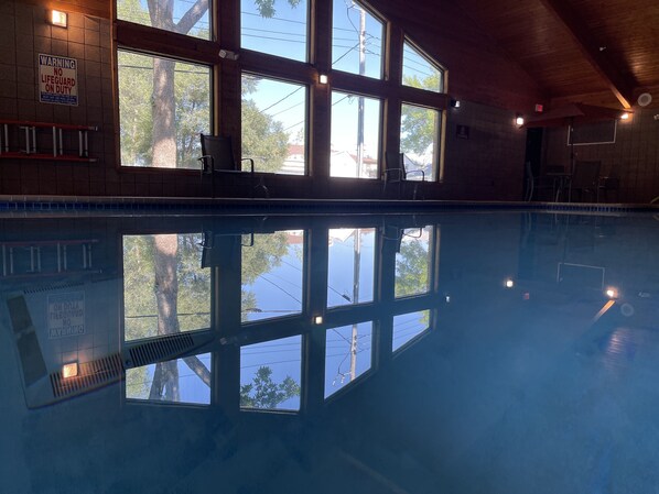Indoor pool, open 7:00 AM to midnight, pool umbrellas, sun loungers
