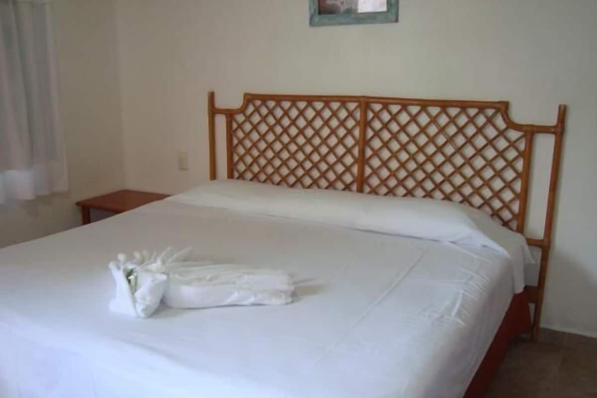 Standard Room, Pool View ( subject to availability) | In-room safe, desk, blackout drapes, iron/ironing board