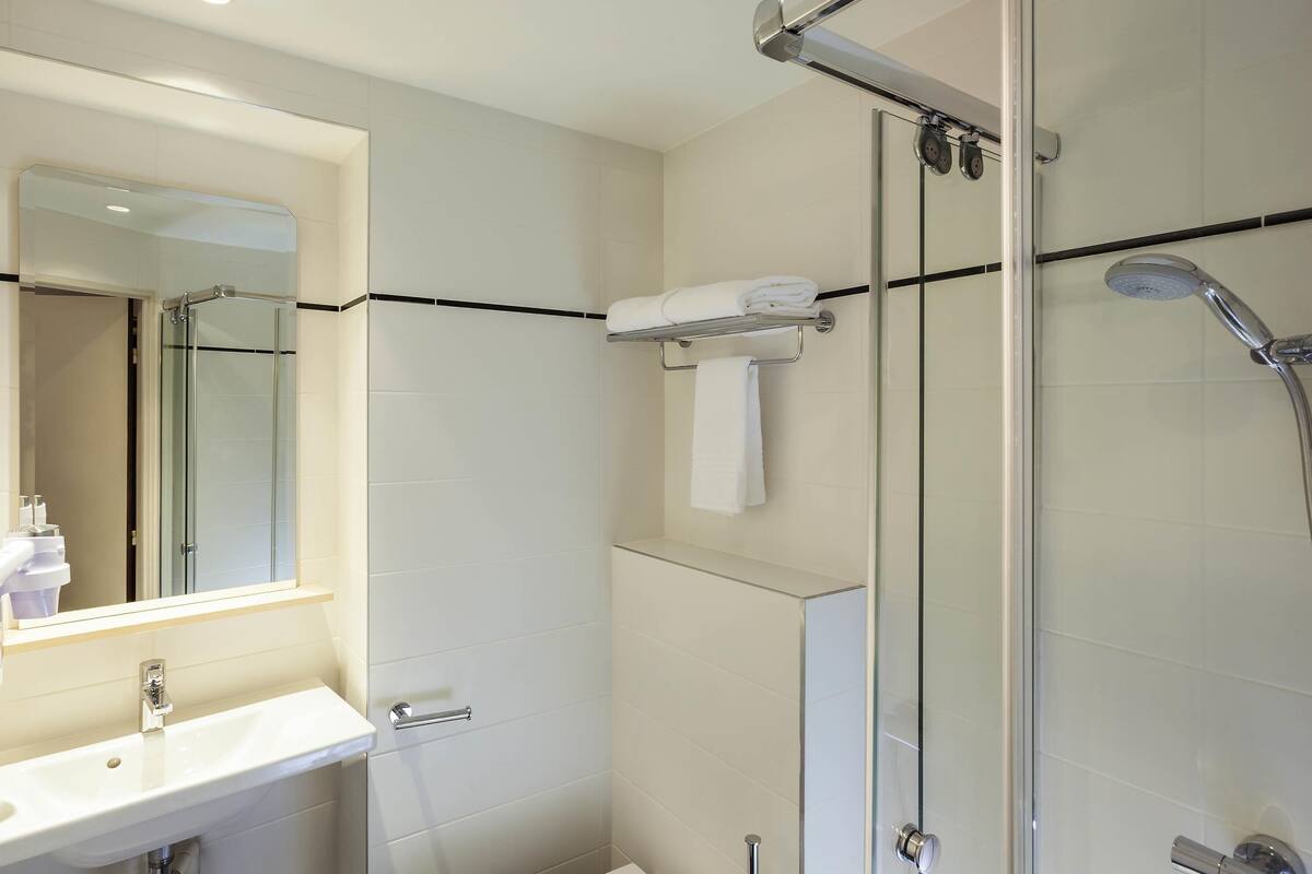 Premium bedding, desk, blackout curtains, soundproofing