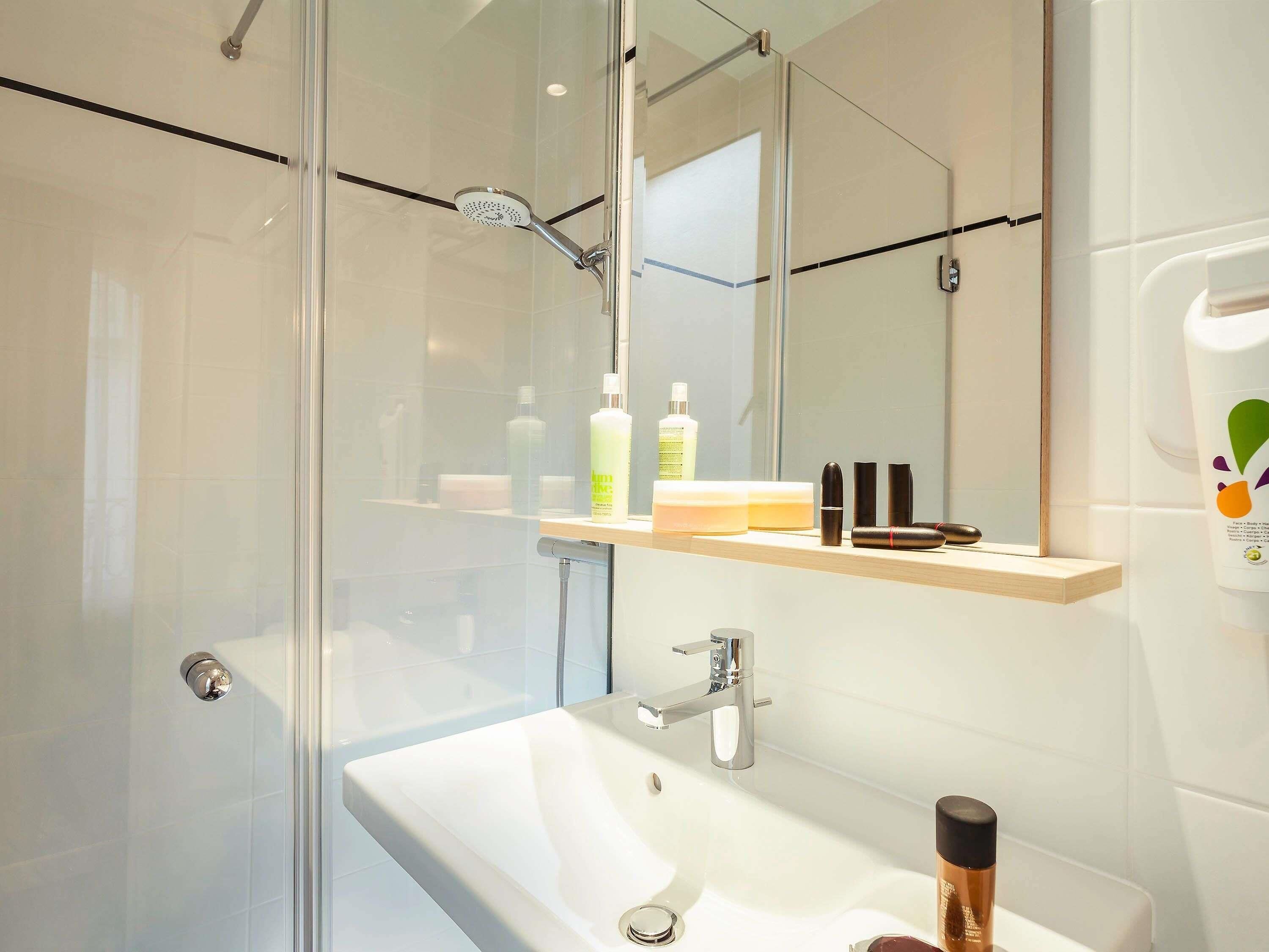Shower, eco-friendly toiletries, hair dryer, towels