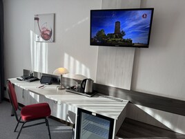 Hypo-allergenic bedding, desk, blackout drapes, iron/ironing board