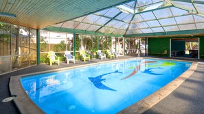 Indoor pool, outdoor pool, pool umbrellas, pool loungers