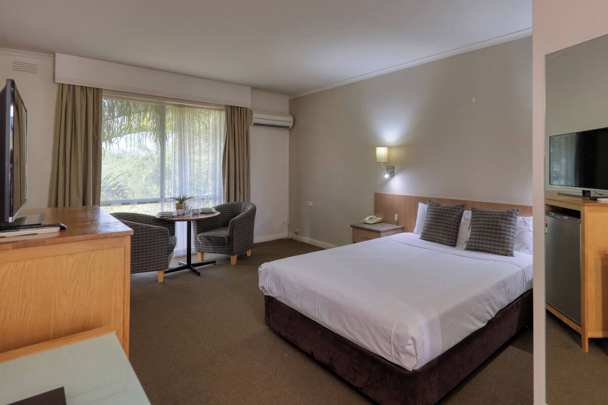 Premium bedding, desk, blackout curtains, soundproofing