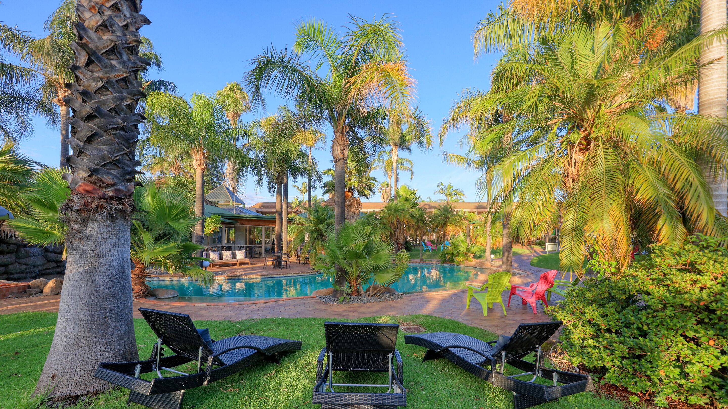 Indoor pool, outdoor pool, pool umbrellas, pool loungers