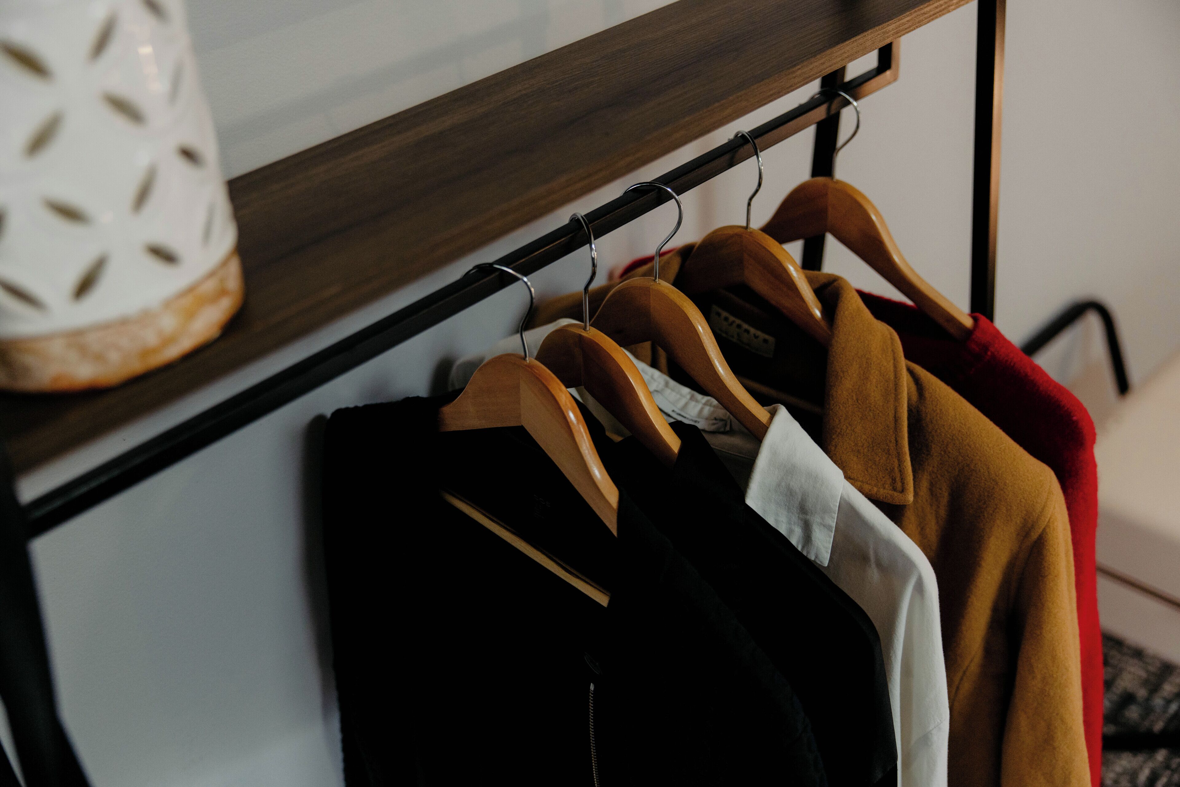 A clothing rack with various garments.