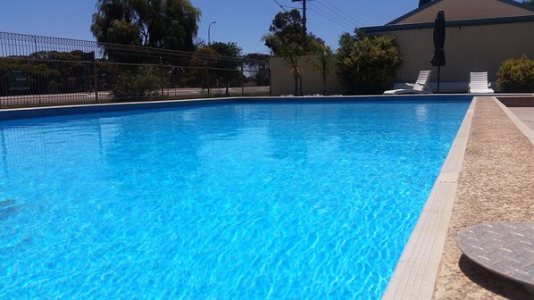 Outdoor pool, pool umbrellas, pool loungers