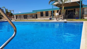 Outdoor pool, pool umbrellas, pool loungers