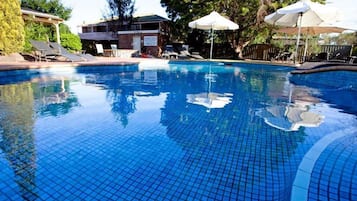 Outdoor pool, open 7:30 AM to 9:00 PM, pool umbrellas, pool loungers