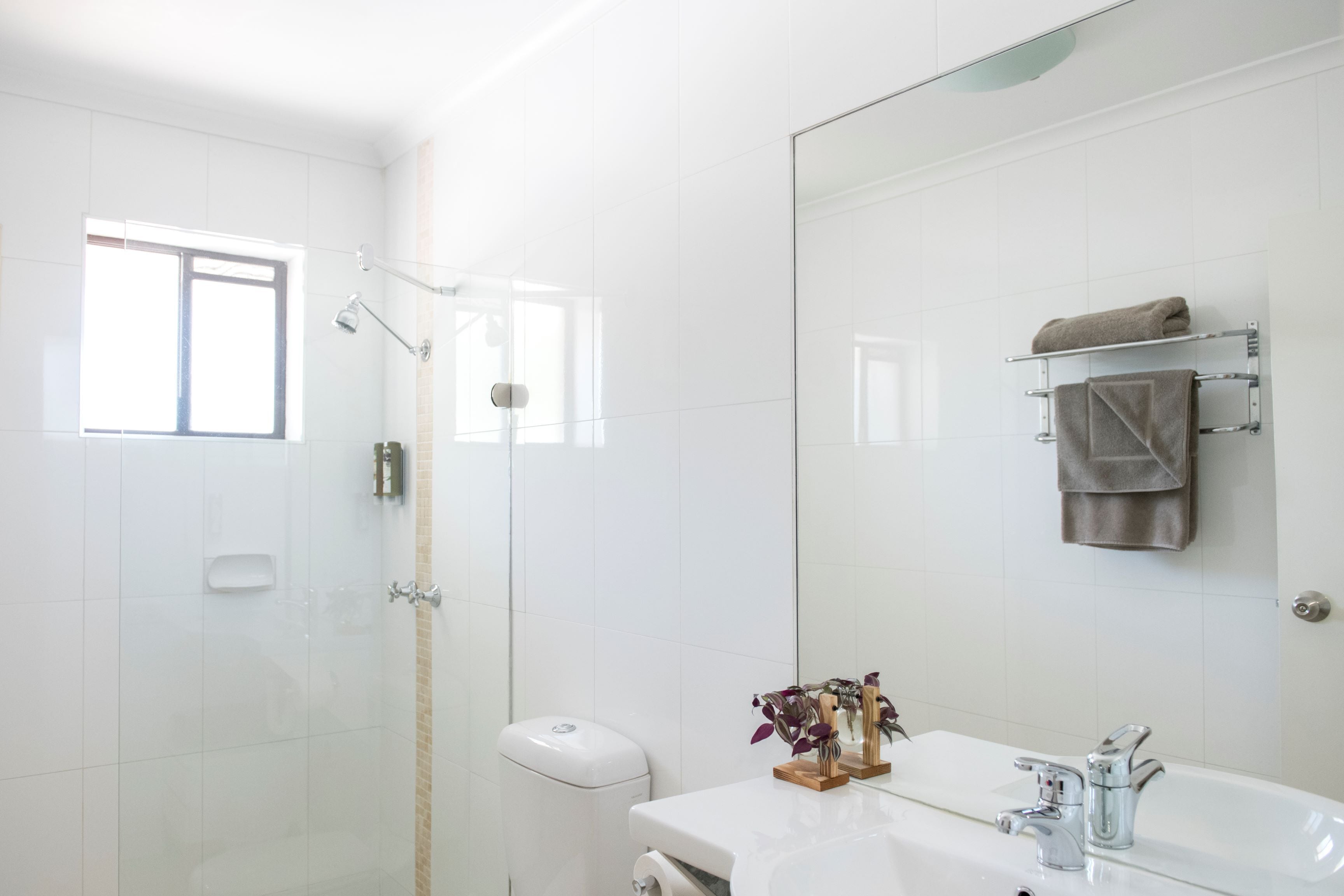 queen room with balcony | bathroom | shower, eco-friendly toiletries, hair dryer, towels