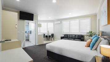 Superior Queen Room with Kitchenette | Down duvets, laptop workspace, blackout curtains, soundproofing