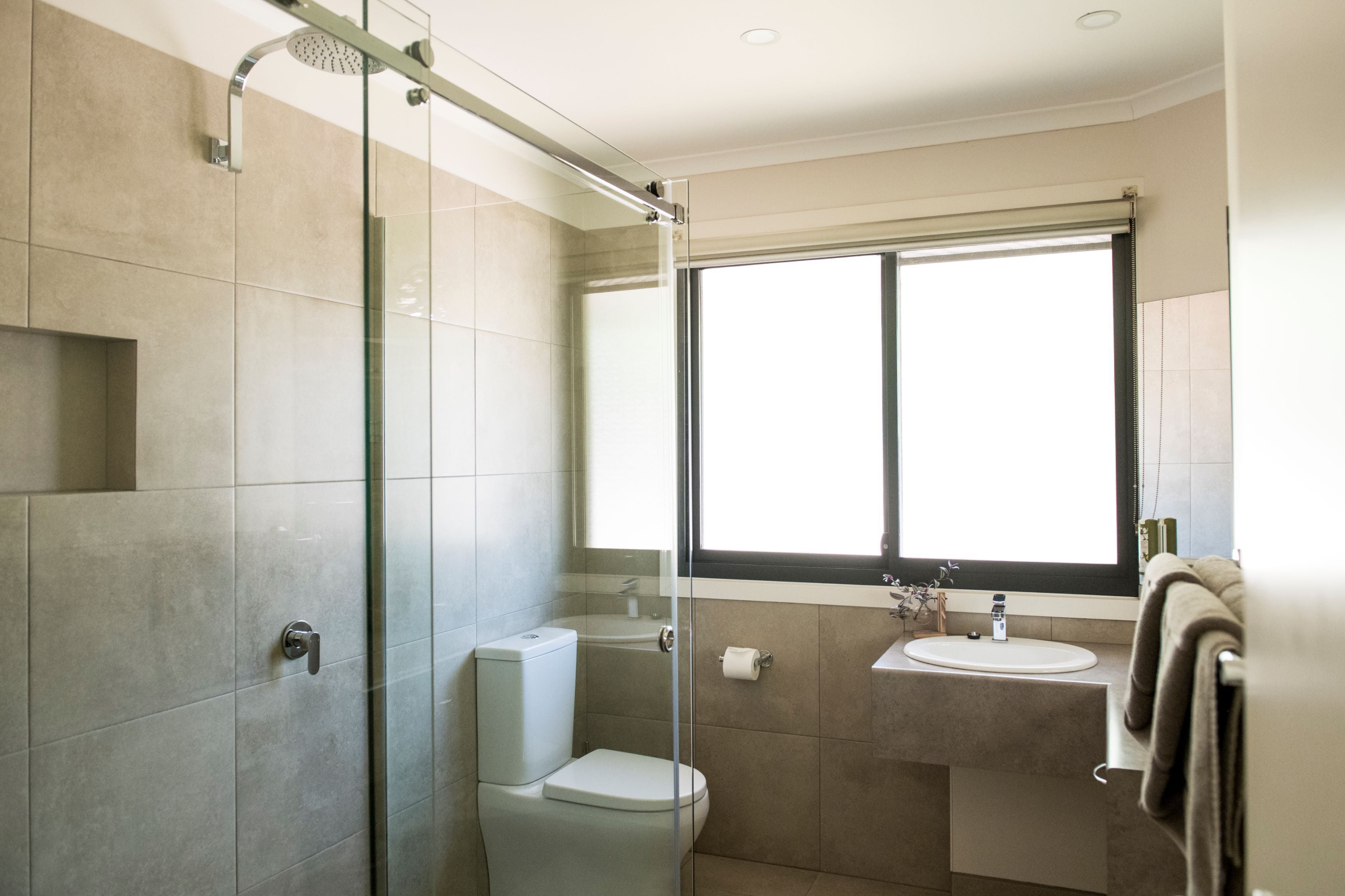 shower, eco-friendly toiletries, hair dryer, towels