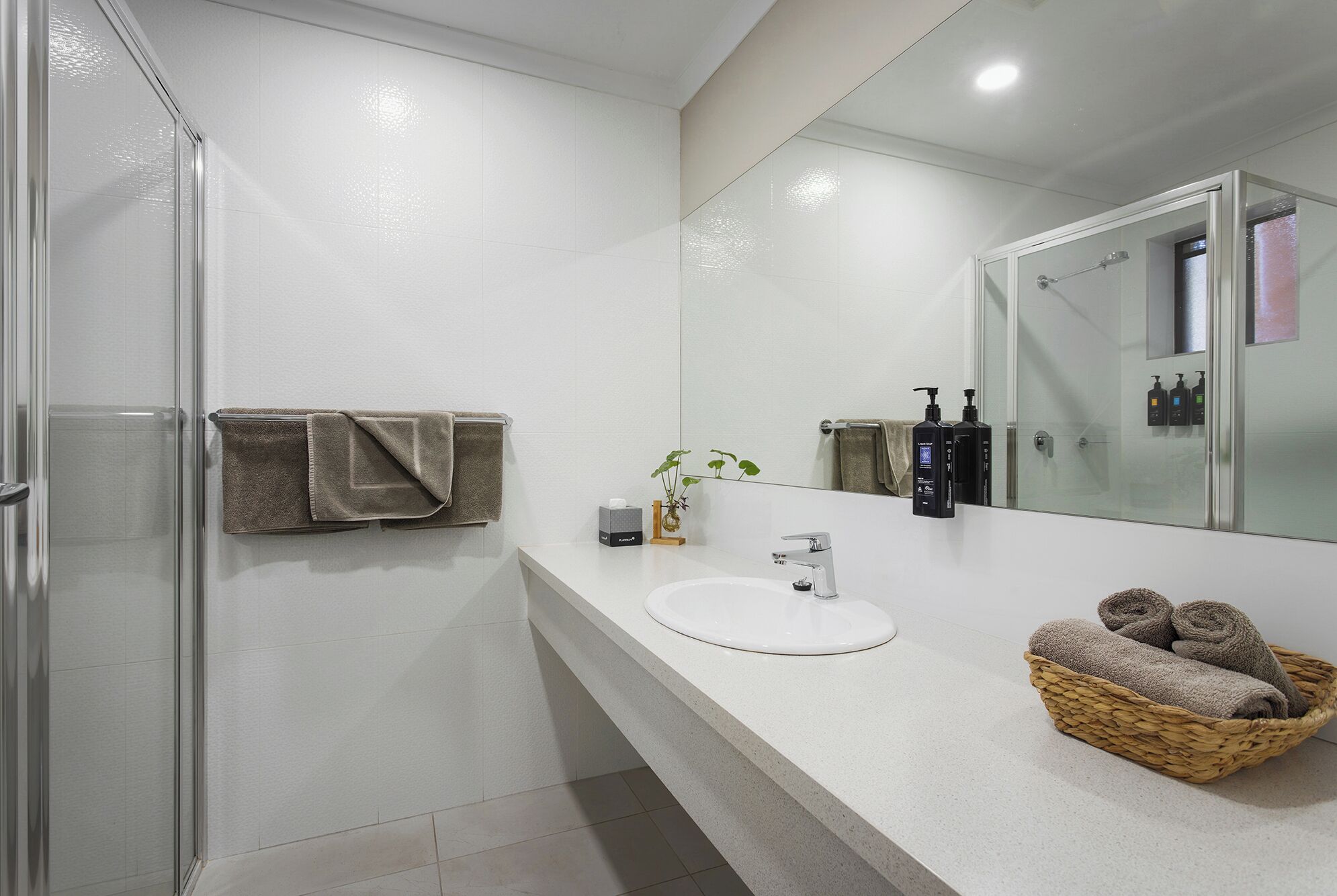 Shower, eco-friendly toiletries, hair dryer, towels