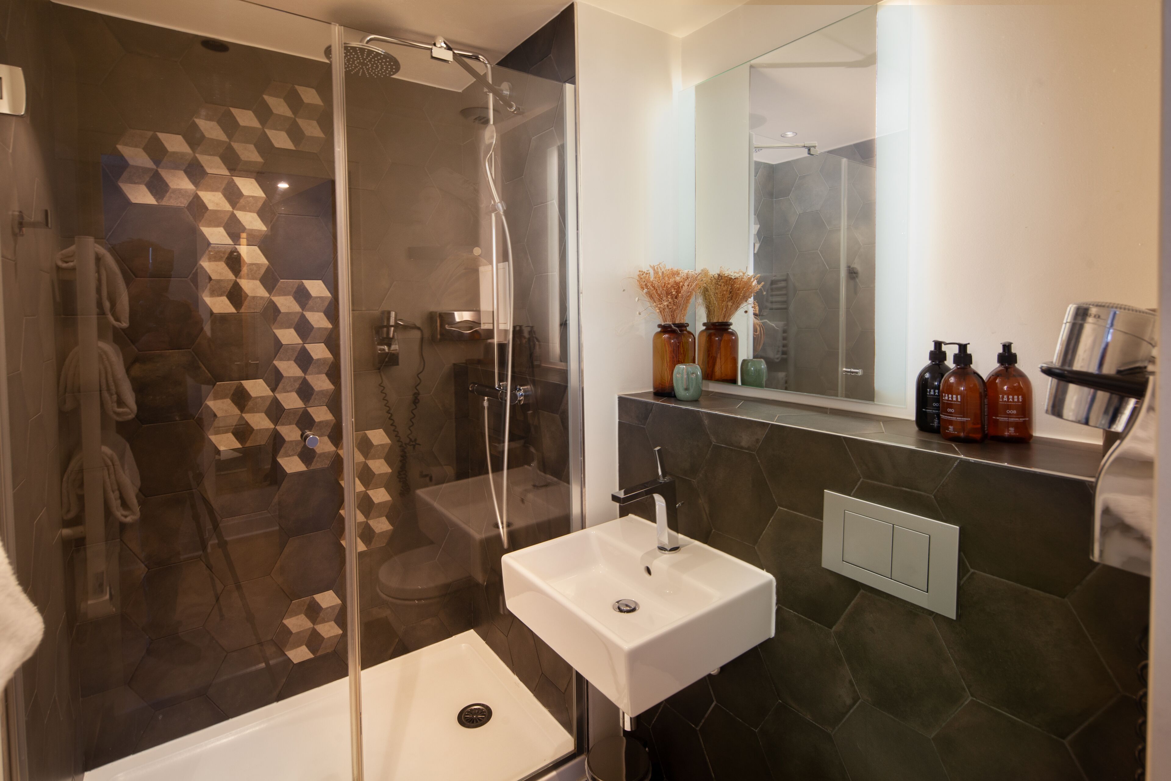 superior double room | bathroom | shower, free toiletries, hair dryer, towels