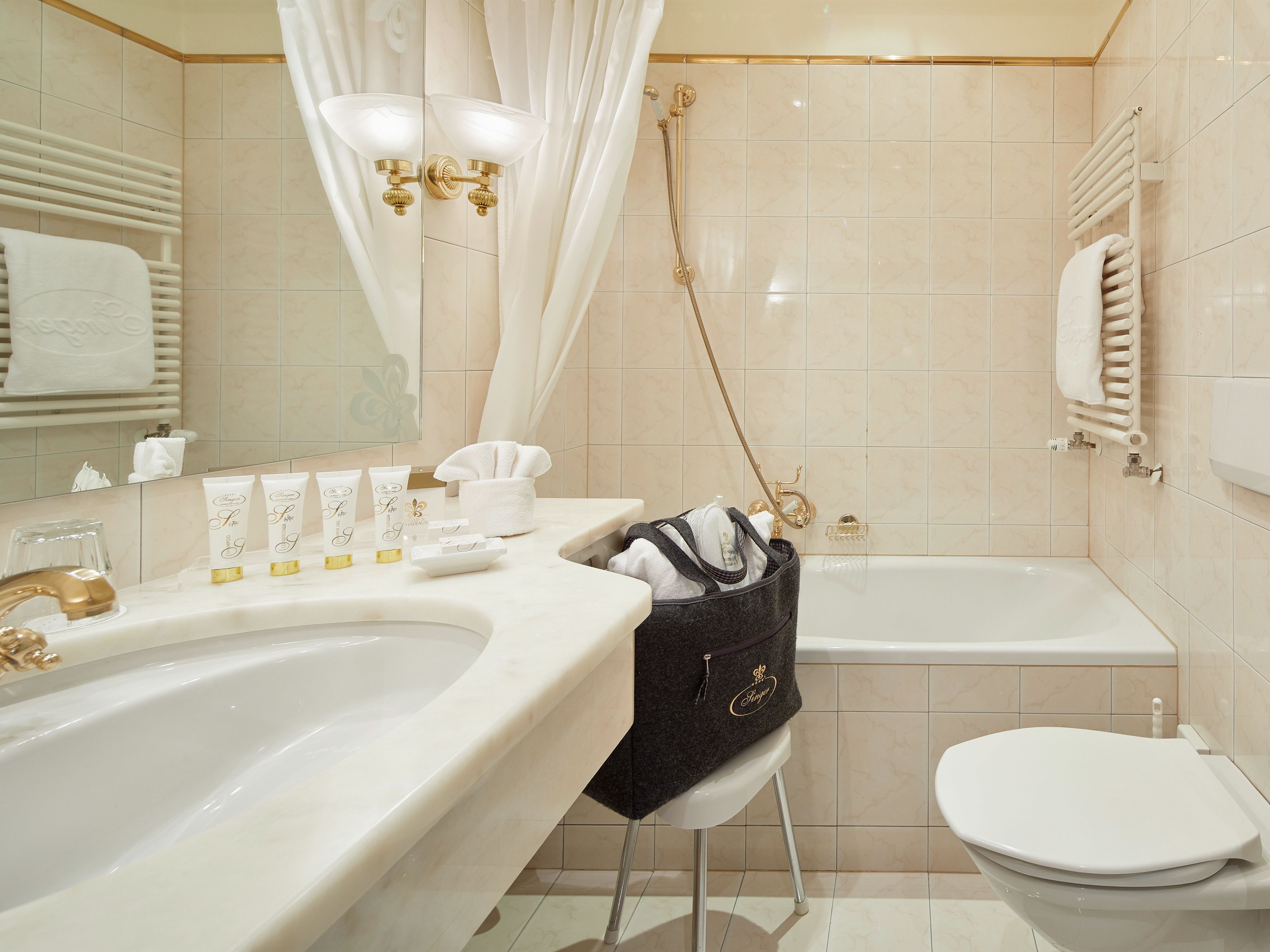 free toiletries, hair dryer, dressing gowns, slippers