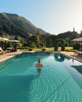 Indoor pool, outdoor pool, pool umbrellas, pool loungers