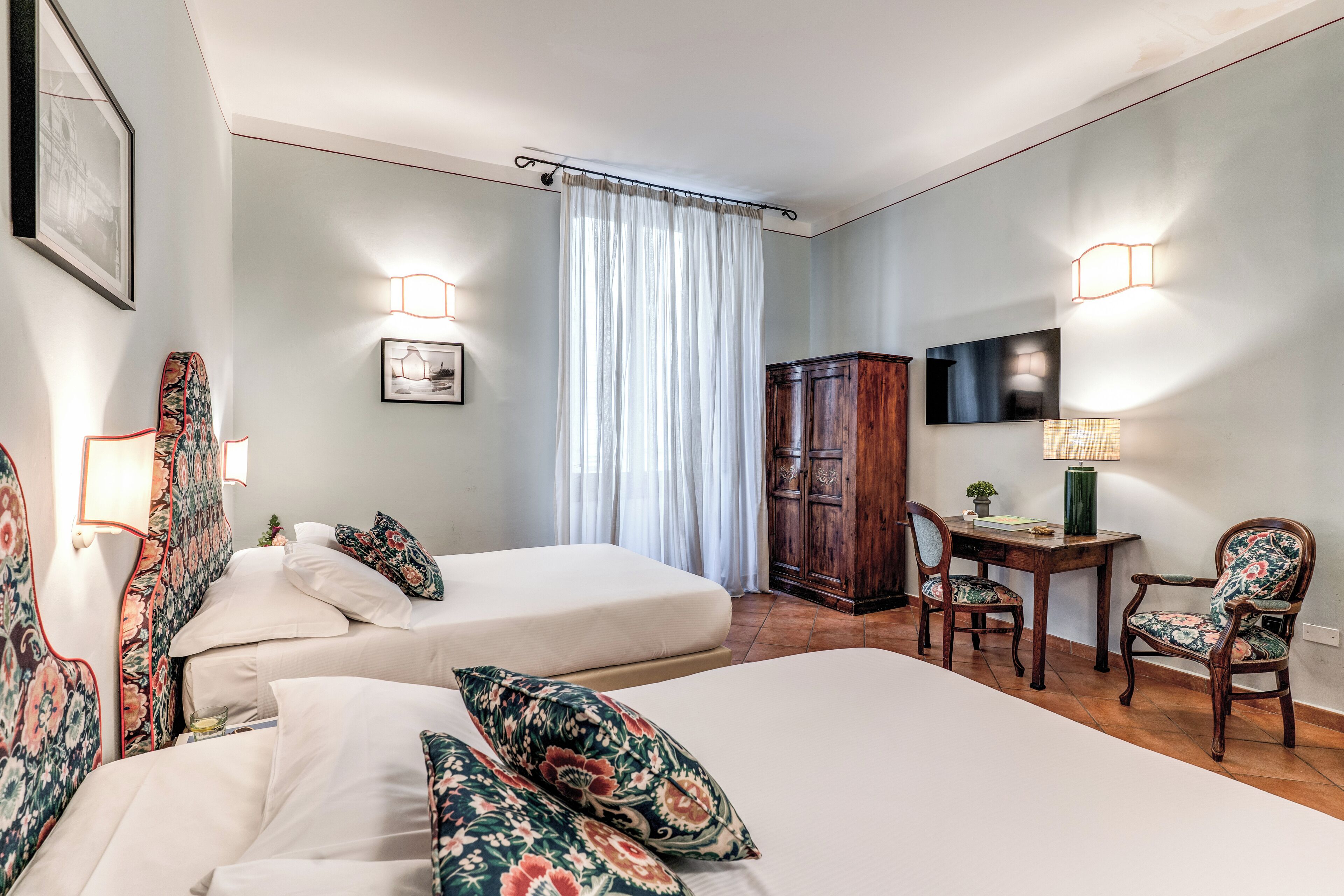 Standard Quadruple Room | Minibar, in-room safe, desk, soundproofing