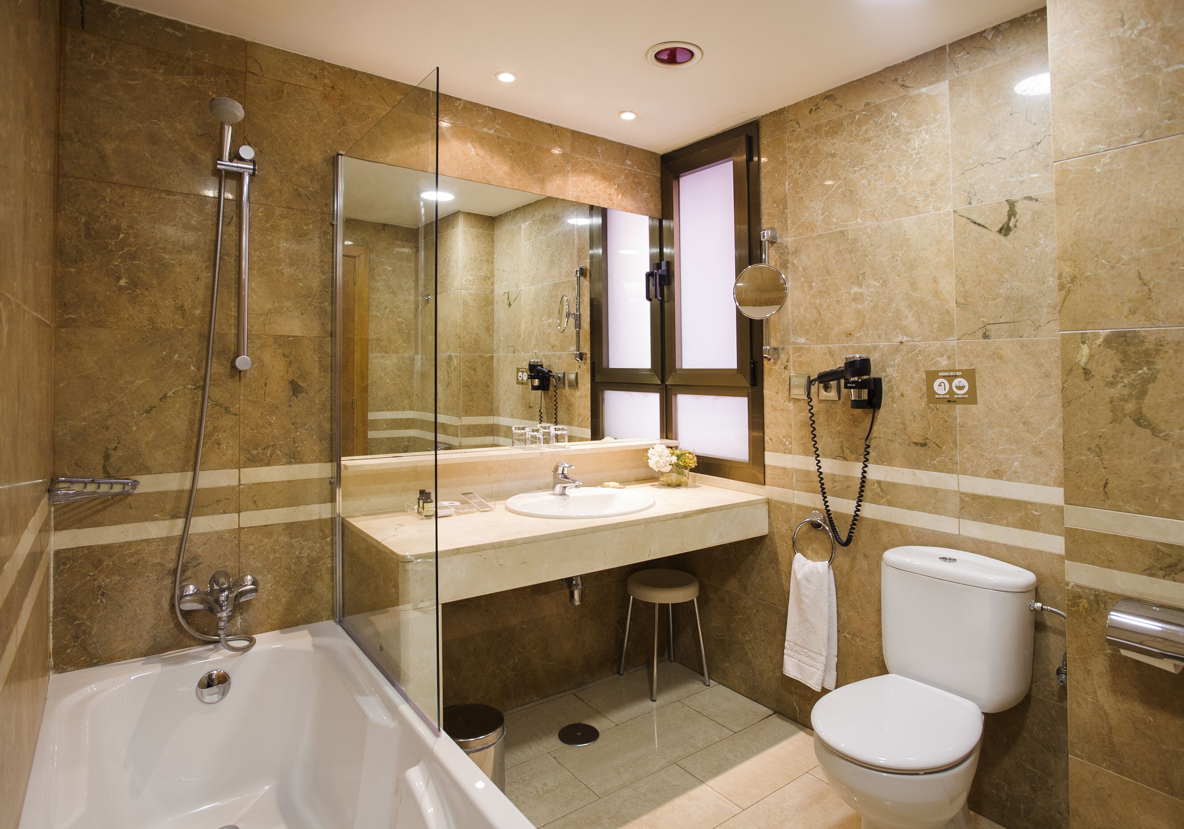 eco-friendly toiletries, hair dryer, bidet, towels