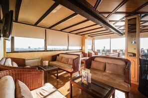 Rooftop bar, ocean views, open daily