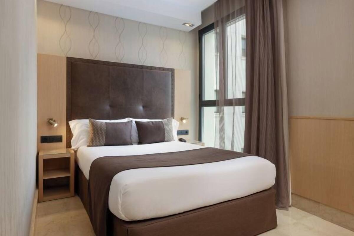 In-room safe, desk, laptop workspace, blackout curtains